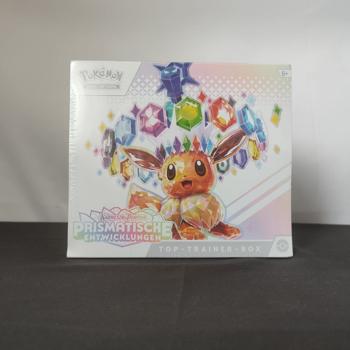 Pokemon Prismatische Entwicklungen Top-Trainer Box